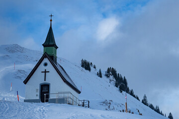 A beautiful chapel on the ridge of Kronberg, a mountain in Switzerland