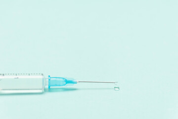 Covid-19 vaccine concept. Syringe with antidote. Antibacterial. Global immunization against the virus. Medical cure.