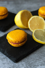 yellow lemon macaroni cookies on a gray background
