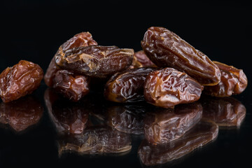 date fruit on a black background