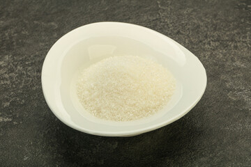 White sugar in the bowl