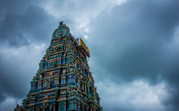 Beautiful view of the gopuram (tower) of Masani Amman Temple. (Translated  from Tamil to English language as Maasani Mother). Located in Anaimalai,  Pollachi, Coimbatore district of Tamil Nadu, India. Stock Photo |