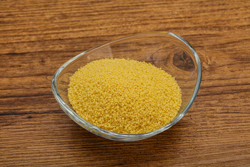 Raw cous cous heap in the bowl