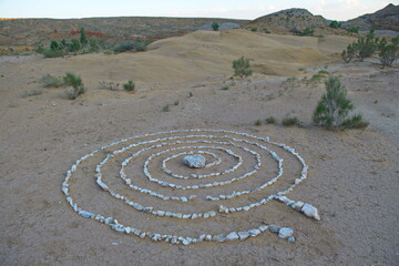 Fototapeta na wymiar Almaty, Kazakhstan - 06.24.2013 : Ritual circle of stones on the ground in the Altyn Emel National Park