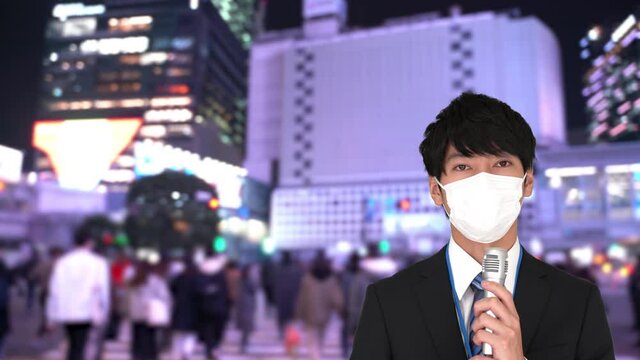 東京　渋谷　2021年1月　取材をするマスクのアナウンサー　イメージ　コロナ感染拡大
