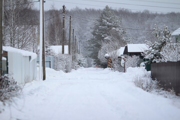 Russian village in winter in the snow