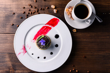 Petit gateau dessert, Traditional Sweet Chocolate cake, chocolate dessert served on large plate