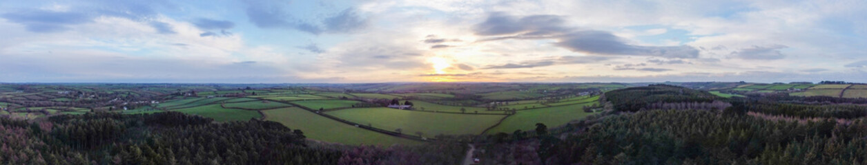 Fototapeta na wymiar aerial shots above farmland near tehidy woods cornwall uk 