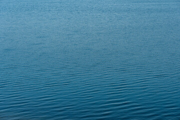 Blue sea surface with small waves. Texture