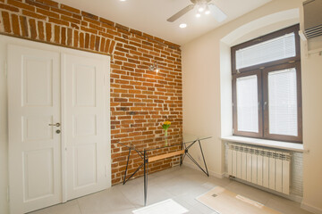 loft, office, designer dining room with glass modern table, brick wall, brown window, white blinds
