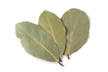 Bay leaf isolated on white background. Three dry bay leaves isolated on white background, close-up. Fragrant dry bay leaves. Culinary spice.