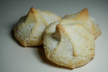Close up of scrumptious trio of raspberry tea cookies. Selective focus.