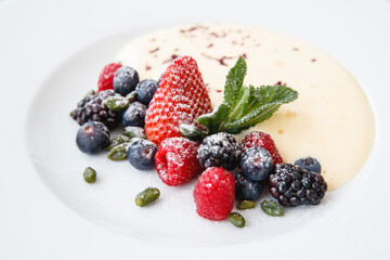 Dessert with cream and fruits