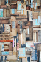 multicolored wooden panel from small pieces, texture for the background