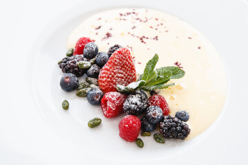 Dessert with cream and fruits