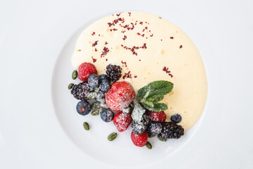Dessert with cream and fruits