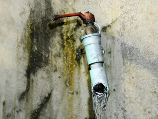 Water from an old PVC tap.