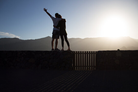 Silhouette Couple Looking Into Distance