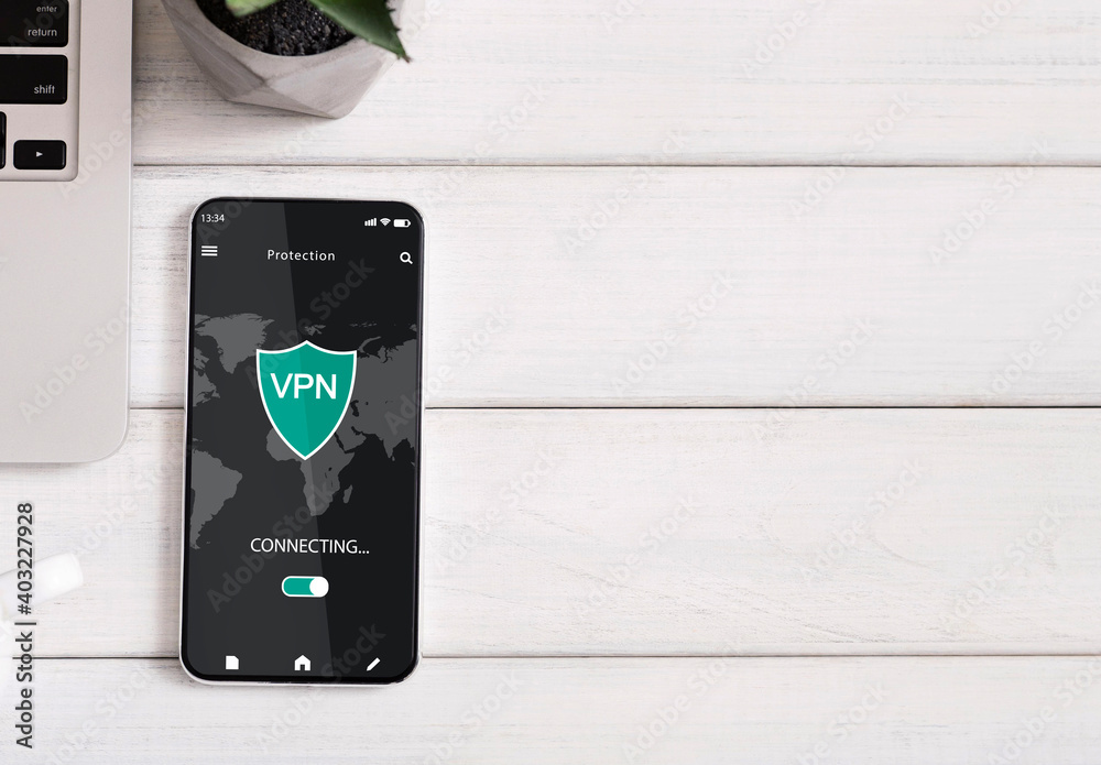 Aufkleber smartphone with vpn app lying on the table