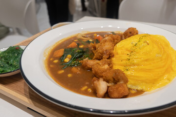 Delicious rice with curry and egg