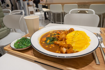 Delicious rice with curry and egg