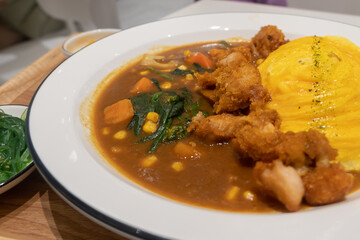 Delicious rice with curry and egg