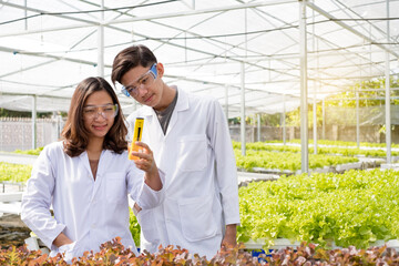 Hydroponics Two Asian scientists have standardized and checked the pH of the hydroponics system of...