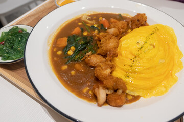 Delicious rice with curry and egg