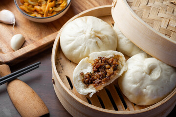 Chinese breakfast. Steamed buns and porridge are on the table