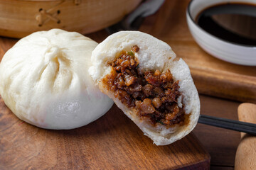 Chinese breakfast. Steamed buns and porridge are on the table