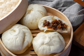 Chinese breakfast. Steamed buns and porridge are on the table
