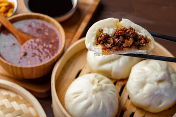 Chinese breakfast. Steamed buns and porridge are on the table