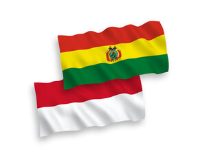 Flags of Indonesia and Bolivia on a white background