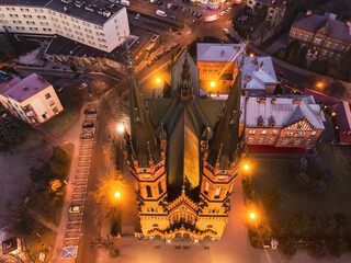 Cathedral of Holy Family in Tarnow, Poland. Top Down Drone Aerial View. Illuminated at Twilight