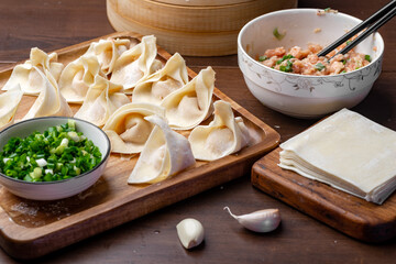 The chef is making meat wonton