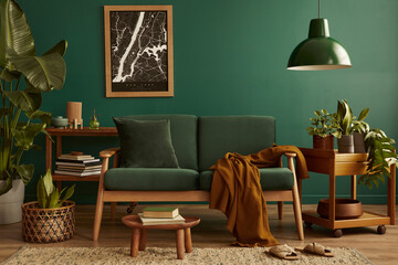 Stylish living room in house with modern retro interior design, velvet sofa, carpet on floor, brown...