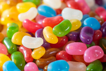 A plate of colourful Jelly Beans on a white background