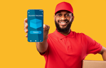 Black man holding smartphone with delivery tracking app