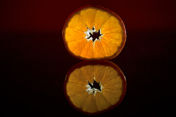 Mandarinenscheibe mit Spiegelung