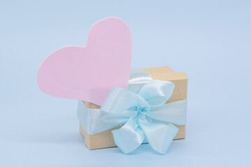 gift craft box on a blue background. Valentine's Day.