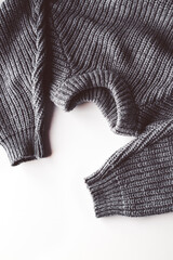 Warm knitted sweater with a pattern. Isolate on white.