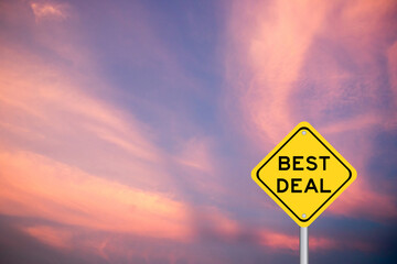 Yellow color transportation sign with word best deal on violet cloud sky background