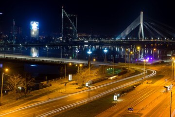 Fototapeta na wymiar Night view of the bridge over the Daugava river