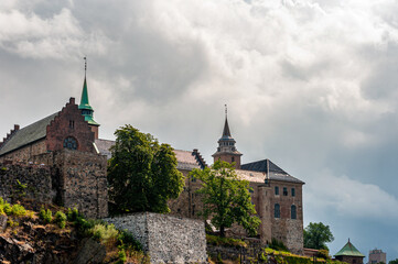 Fototapeta premium July 27, 2013 Oslo, Norway Akershus Fortress on a cloudy day.