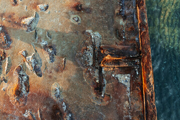Old rusty textured metal surface. Conception of aging and decay