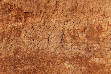 Top close up view of surface on the beach. Details of colorful soil