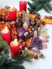 Crystals gemstones, natural winter seasonal decor, candles. Witchcraft Ritual, energy healing minerals. Esoteric, relax, life balance, modern magic concept. Christmas, Magical Winter Solstice