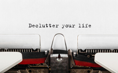 Text Declutter your life typed on retro typewriter