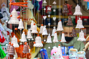 Decorative toys with city symbols being sold on Lviv Christmas Market in front of the Lviv Opera House..Christmas fair in Lviv, Ukraine 2021.