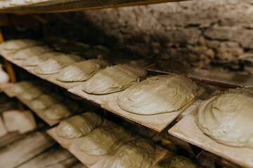 Wet clay prepairing for the work on the shelf